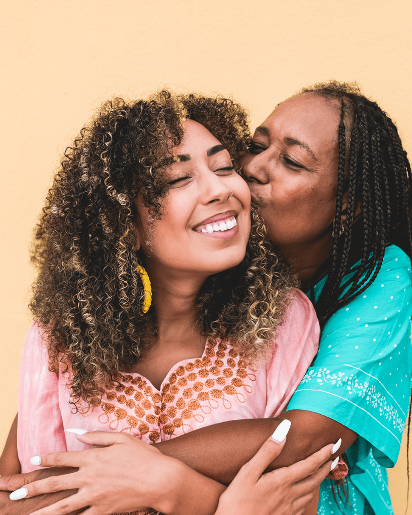 mom and daughter hug