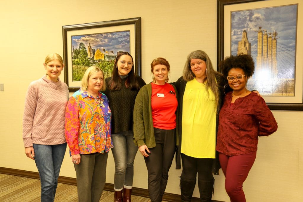 Sandwiched KC board members and volunteers with Gilda's CLub Program Director