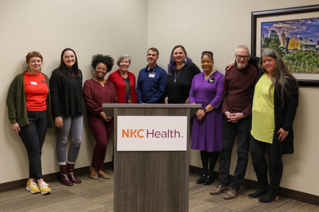 Sandwiched KC board members and volunteers with Voices of Care Panelists and Gilda's CLub Program Director